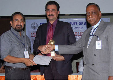 ARCHITECT Dr. Oscar G. CONCESSAO RECEIVING "ARCHITECTURAL CREATION OF THE YEAR AWARD - 2012" AWARDED BY THE IIA TN CHAPTER FROM SHRI. SABU CYRIL NATIONAL AWARD WINNING ART DIRECTOR