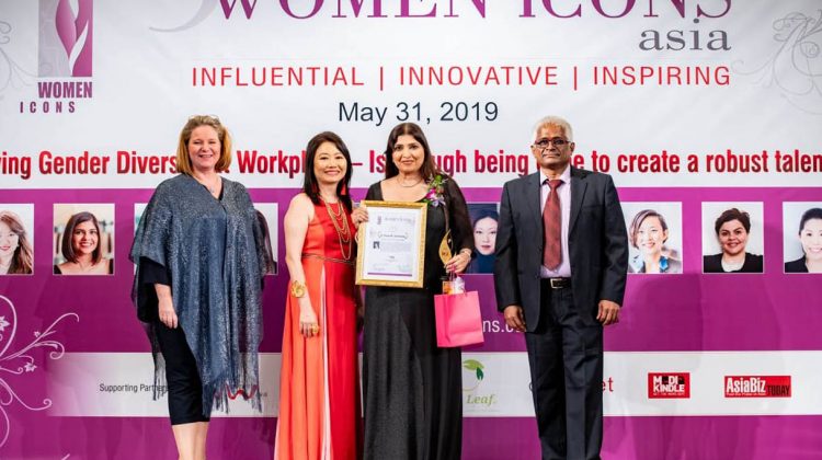 ARCHITECT Dr. PONNI M. CONCESSAO RECEVING THE "BERG WOMEN ICON ASIA AWARD" FROM MR. VISWESH IYER, MS. VICTORIA MURPHY, MS. CHRISTINA TEO AT SINGAPORE RECENTLY